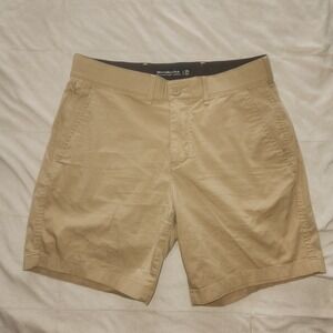 Abercrombie & Fitch Men's Khaki Flat Front Shorts in tan. Size 29